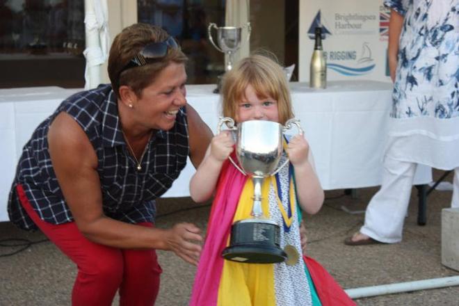 Sue Bouckley of Learning and Skills Solutions presents three year old Josie Heppell with her Youngest Crew trophy ©  Mandy Bines